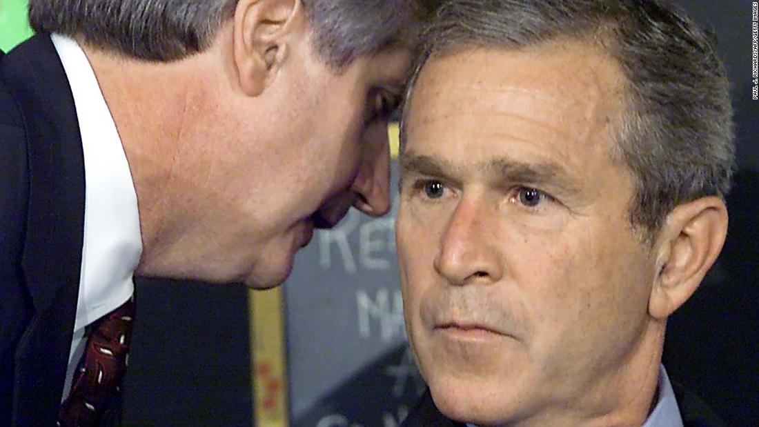 White House Chief of Staff Andrew Card informs Bush about the September 11 terrorist attacks in 2001. At the time, the President was visiting a school in Sarasota, Florida.