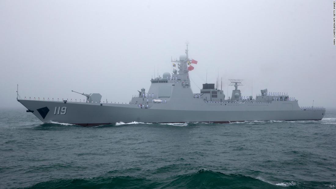A Type 052D Chinese guided missile destroyer participates in a naval parade to commemorate the 70th anniversary of the founding of China&#39;s PLA Navy in 2019. 