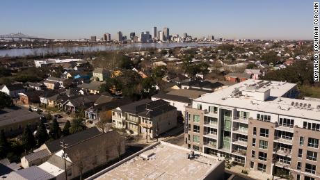 The Saxony, a luxury condominium complex in the Bywater neighborhood of New Orleans, broke ground in 2019. Units in the building can cost up to $645,000 and can be used as short-term rentals. In the aftermath of Hurricane Katrina, housing prices in New Orleans neighborhoods near the Mississippi River began rising in part due them being built on some of the highest ground in the city, drastically altering the demographics of some neighborhoods along the river. Edmund D. Fountain for CNN