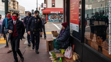 Oakland&#39;s deputy chief of police visits businesses around the city&#39;s Chinatown on February 16.