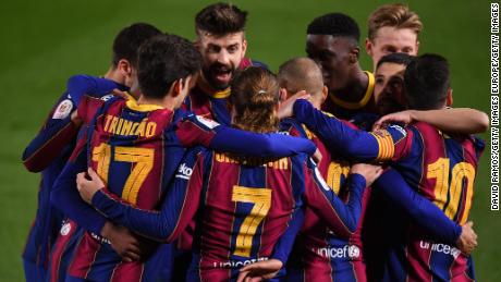 Barcelona players celebrate Martin Braithwaite&#39;s winner against Sevilla.