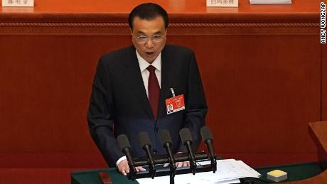 Chinese Premier Li Keqiang delivers a speech during the opening session of China&#39;s National People&#39;s Congress at the Great Hall of the People in Beijing on Friday.