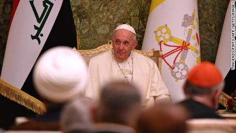 Pope Francis attends a meeting at Iraq's presidential palace in Baghdad.