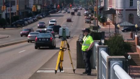 Danielle Willkens works on the Edmund Pettus Bridge after the re-creation project began in 2016.