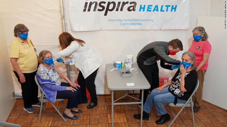 From left, Rose Ramsey, Edith Camp, Nora McDonald, and Bernice Cecil receive the second dose of the Pfizer/BioNTech Covid-19 vaccine at Inspira Medical Center Mullica Hill.