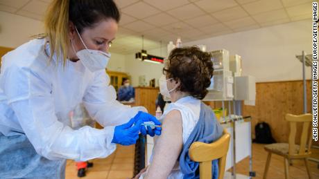 An elderly local resident is inoculated with the Pfizer-BioNTech vaccine in Seidewitz on March 1, 2021 near Naumburg, Germany.