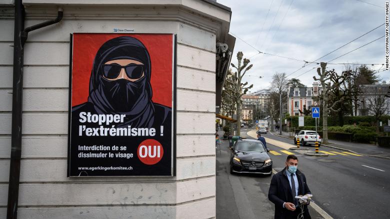 Switzerland narrowly votes to ban face covering in public