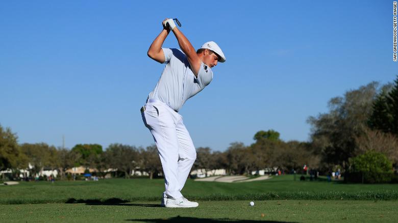 DeChambeau plays his shot from the 11th tee during the final round of the Arnold Palmer Invitational.