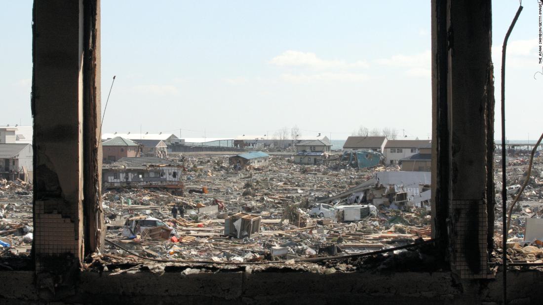 More than 20,000 people died or went missing in the earthquake and subsequent tsunami. Kadowaki Elementary School provides a view of the ruined city of Ishinomaki, Miyagi prefecture.