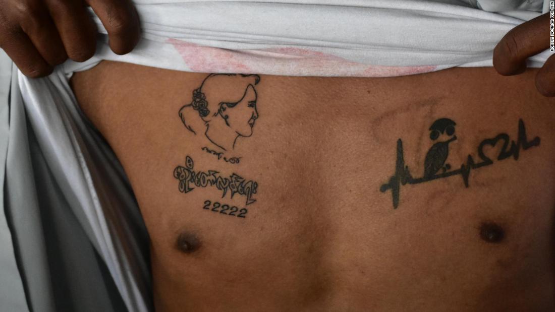 Myanmar protesters get permanent symbols of resistance – tattoos