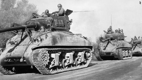 French tanks patrol a North African road near Blida, Algeria, on November 4, 1954.