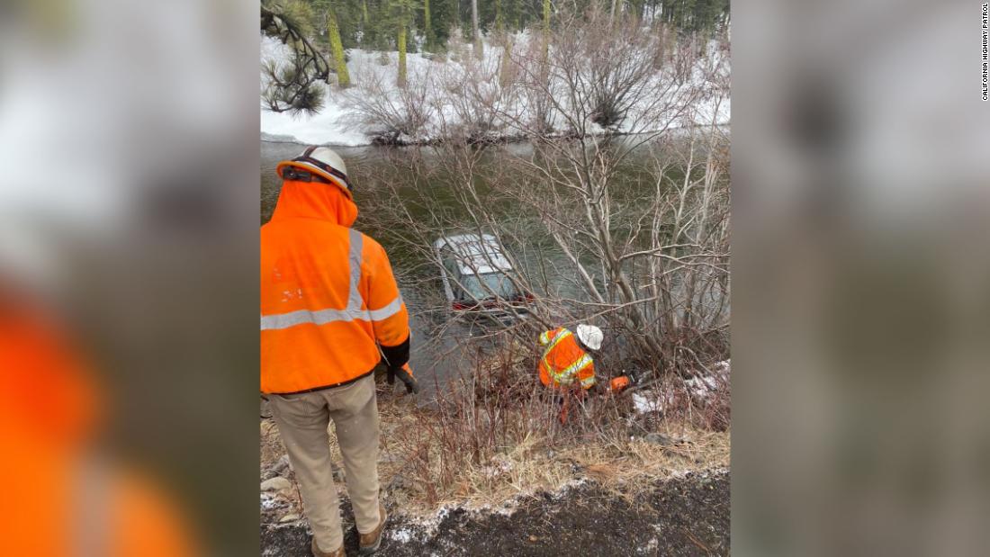 A woman crashed her car into a freezing river. A FedEx driver saw it happen and saved her