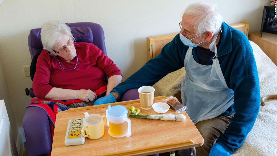 They can only hold hands, but for the elderly in Britain, first contact with a relative ‘means everything’