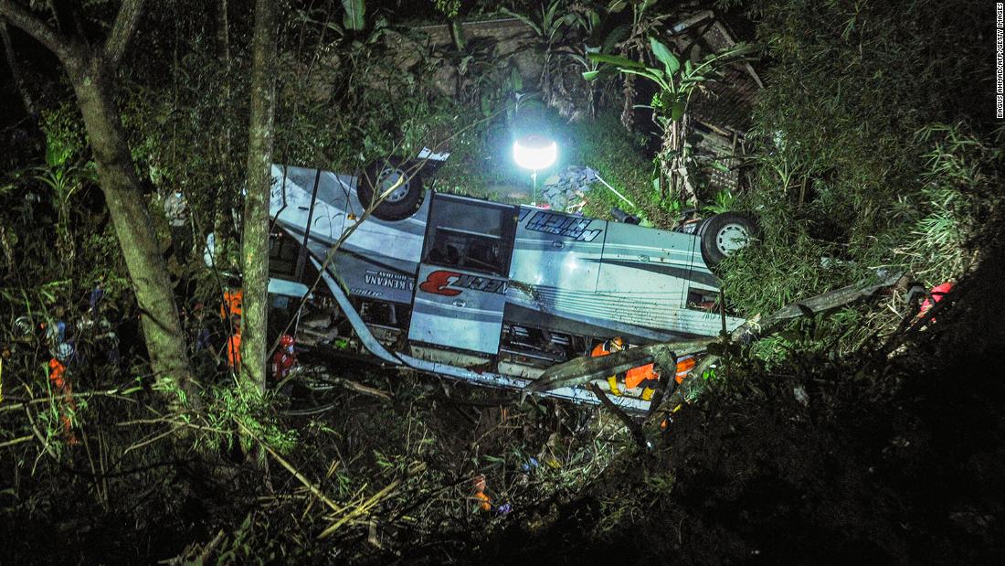 Indonesian bus with school children crashes into gorge and kills 27