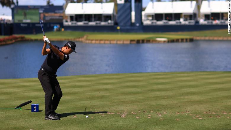 Na plays his shot from the 17th tee during the first round of THE PLAYERS Championship.