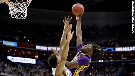 Naz Reid of the LSU Tigers shoots the ball against Kenny Goins  of the Michigan State Spartans during the second half in the East Regional game of the 2019 NCAA Men&#39;s Basketball Tournament at Capital One Arena on March 29, 2019, in Washington, DC.