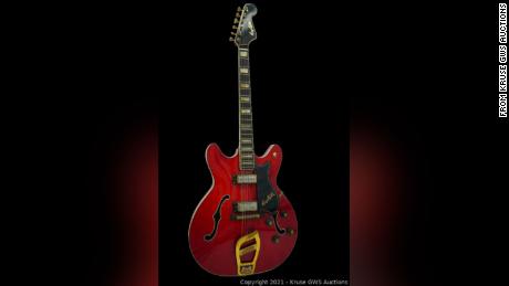 The flaming red Hagstrom Viking II guitar is up for auction.
