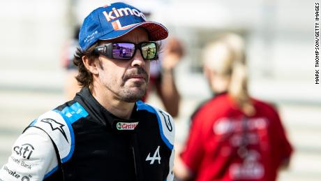 Fernando Alonso of Spain and Alpine F1 Team looks on from the grid during Day One of F1 Testing at Bahrain International Circuit on March 12, 2021 in Bahrain, Bahrain.