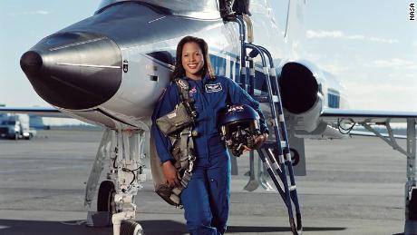 Retired astronaut Joan Higginbotham in front of a NASA T-38 trainer in 2003.