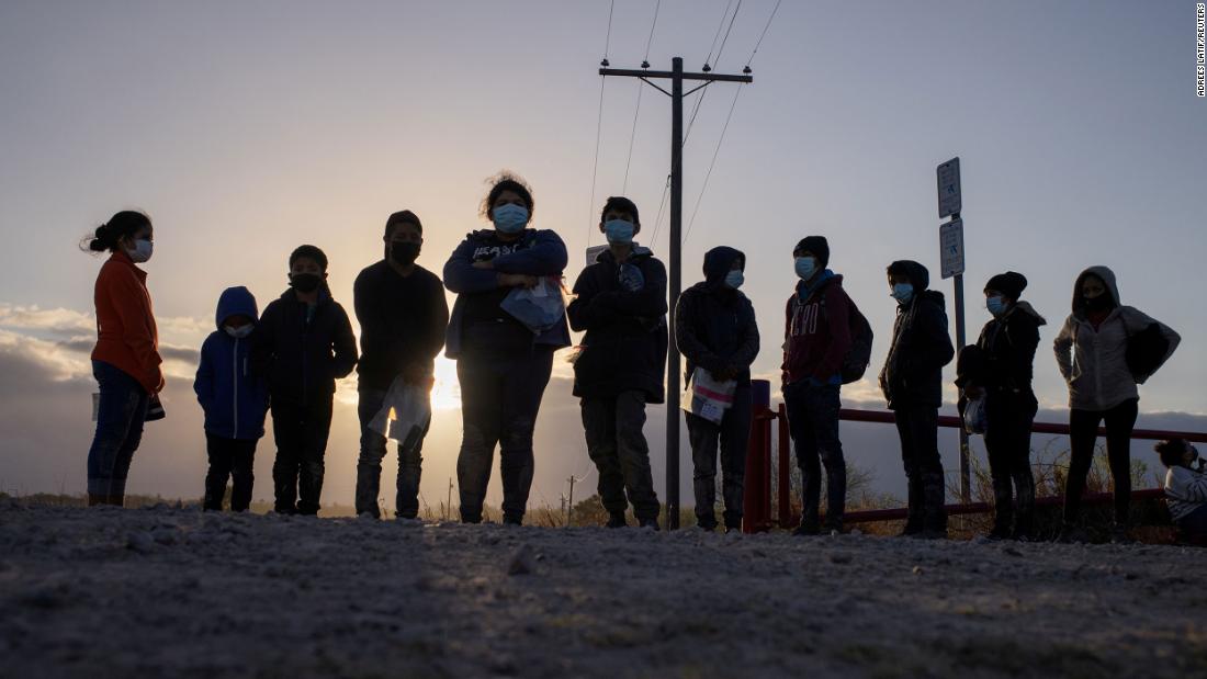 Migrants from Central America await transport in Penitas, Texas, on March 12.