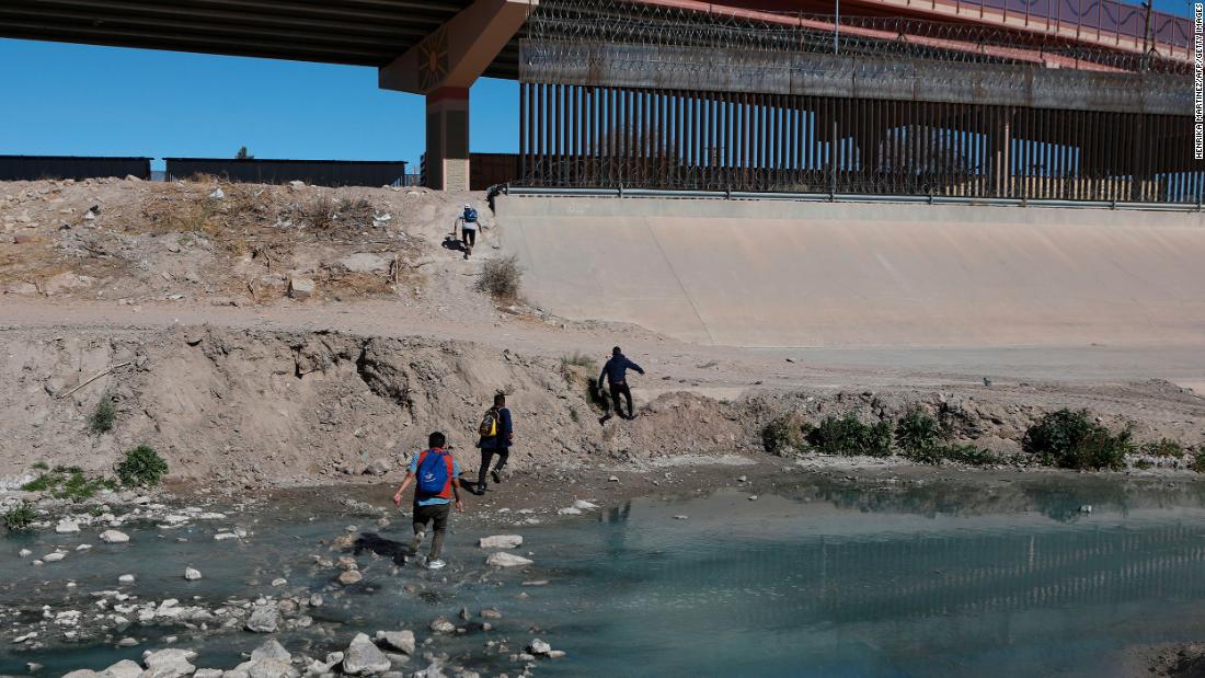 Migrants cross the Rio Bravo to get to El Paso, Texas, from Ciudad Juarez, Mexico, on February 5.