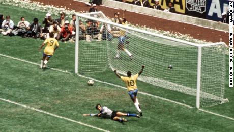 Carlos Alberto and Pelé celebrate an iconic goal marking the final score of 4-1 as Brazil beat Italy to win the World Cup for a third time.