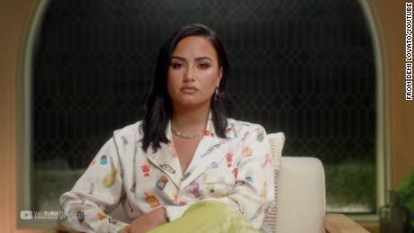 Pop star Demi Lovato opens up in a scene from her new docuseries.