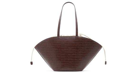 Who carries what Kory synthetic leather bag