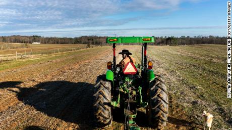Fourth generation crop farmer John Boyd, president of the Black Farmer&#39;s Association, plants winter wheat in one of his fields in Baskerville, Virginia on Tuesday January 8, 2019. 