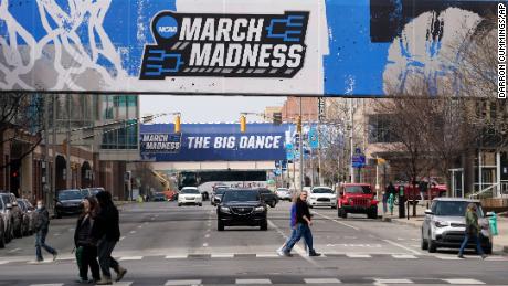 March Madness banners for the NCAA college basketball tournament are seen in downtown Indianapolis on March 17, 2021.