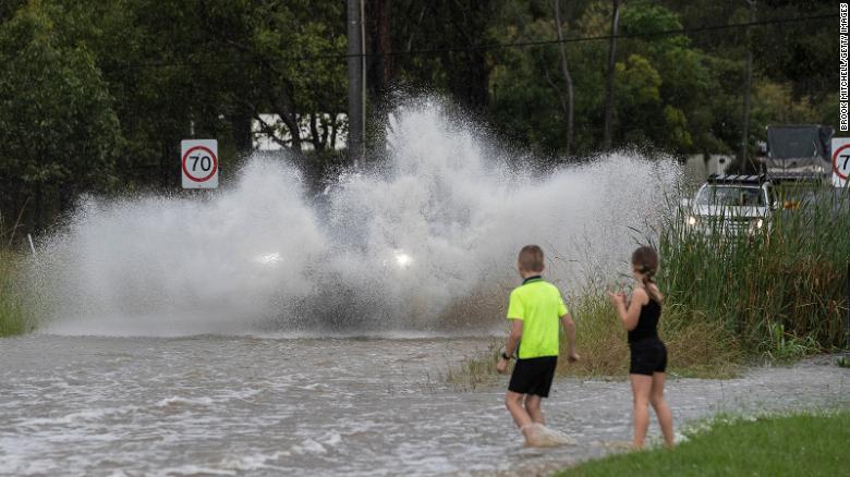 Entire house floats away as flash floods batter Australia’s east coast