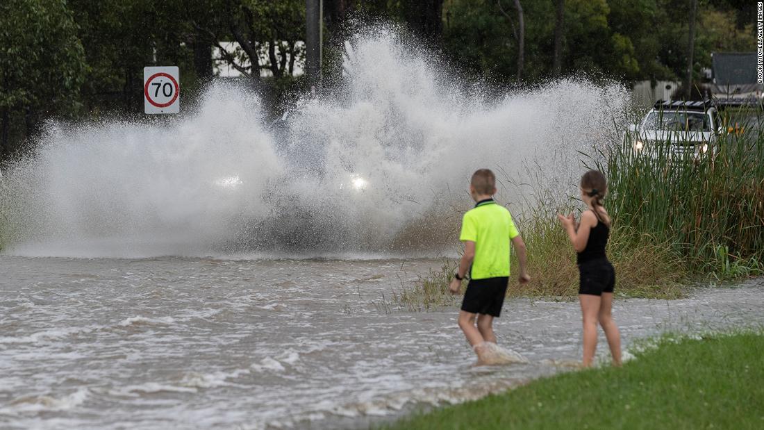 Entire house floats away as flash floods batter Australia's east coast