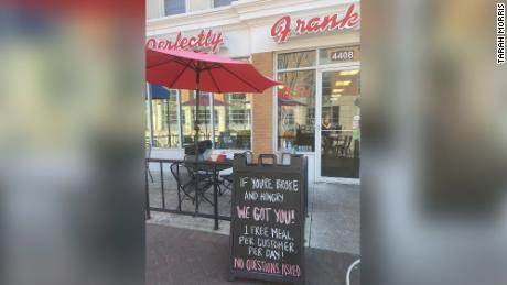 The Perfectly Frank exterior sign inviting customers for a free meal.