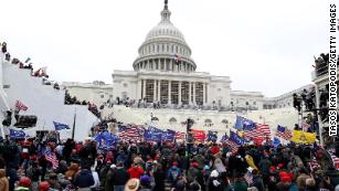 Judge rebukes GOP for downplaying US Capitol riot as he hands out first sentence in insurrection