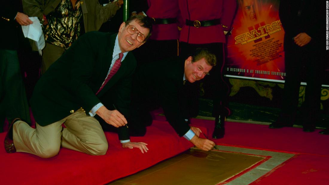 Shatner and Leonard Nimoy leave their handprints in Hollywood in 1991.