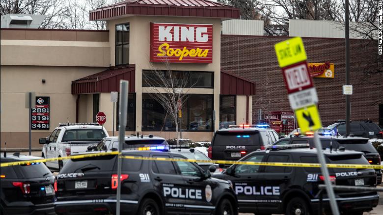 Police respond to the King Soopers grocery store in Boulder after a gunman opened fire Monday.