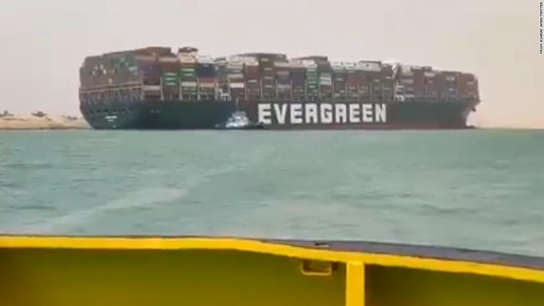 Container ship runs aground in Suez Canal causing traffic jam
