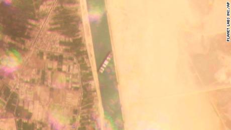 This satellite image from Planet Labs Inc. shows the Ever Given stuck in the Suez Canal on Tuesday.