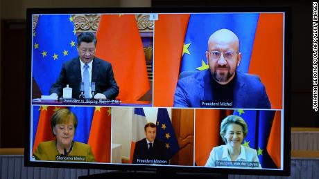 European Commission President Ursula von der Leyen, European Council President Charles Michel, German Chancellor Angela Merkel, French President Emmanuel Macron and Chinese President Xi Jinping during a video conference to approve an investment pact between China and the EU on December 30, 2020.