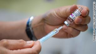 Mixing Covid-19 vaccines tied to more side effects, early UK data suggests
