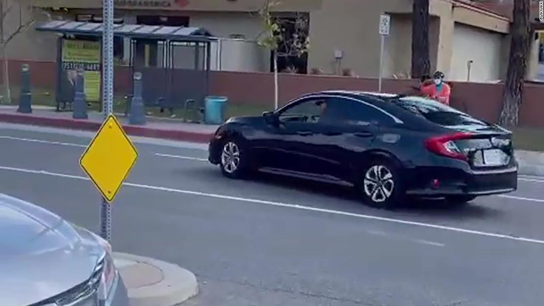A man drove through a crosswalk during a 'Stop Asian Hate' rally and authorities say they're investigating the incident as a hate crime