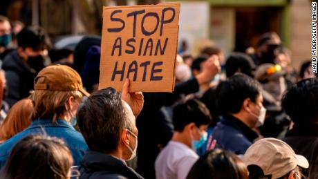 Demonstrators gather in the Chinatown-International District for a &quot;We Are Not Silent&quot; rally and march against anti-Asian hate and bias on March 13, 2021 in Seattle, Washington. (Photo by David Ryder/Getty Images)