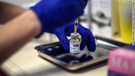 A nurse prepares a dose of the AstraZeneca vaccine at the Edouard Herriot hospital on Feb. 6 in Lyon, France.