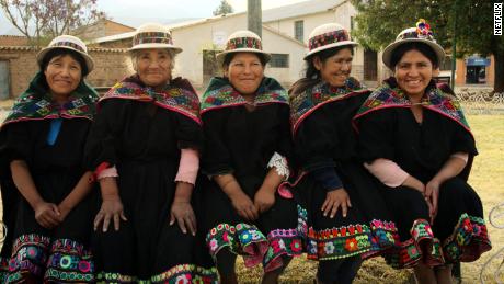 Andean women are shown in traditional dress in a scene from &quot;Magical Andes: Season 2&quot; on Netflix.