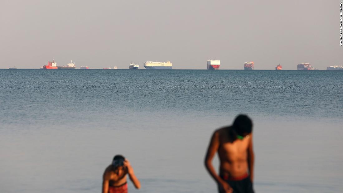 Ships anchored outside the Suez Canal in Ismailia, Egypt, on Thursday. Ships couldn&#39;t get through while the Ever Given was blocking the route.