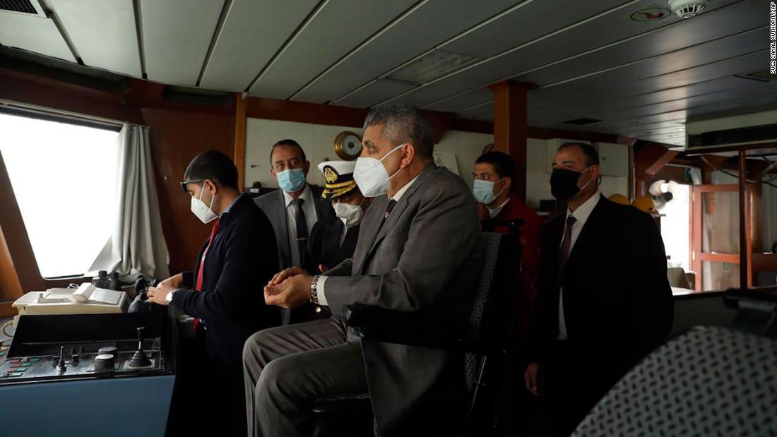 Lt. Gen. Ossama Rabei, the head of the Suez Canal Authority, watches the Ever Given from another vessel on Thursday.