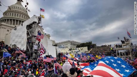 Trump supporters clash with police and security forces as people try to storm the US Capitol on January 6, 2021 in Washington, DC. 