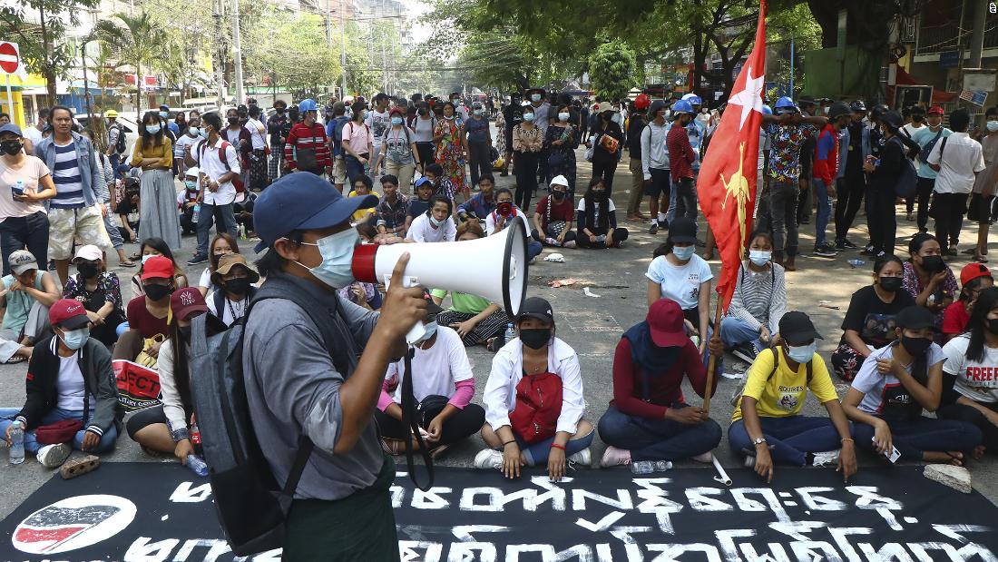 Protesters occupy a street during a rally in Yangon on March 27.
