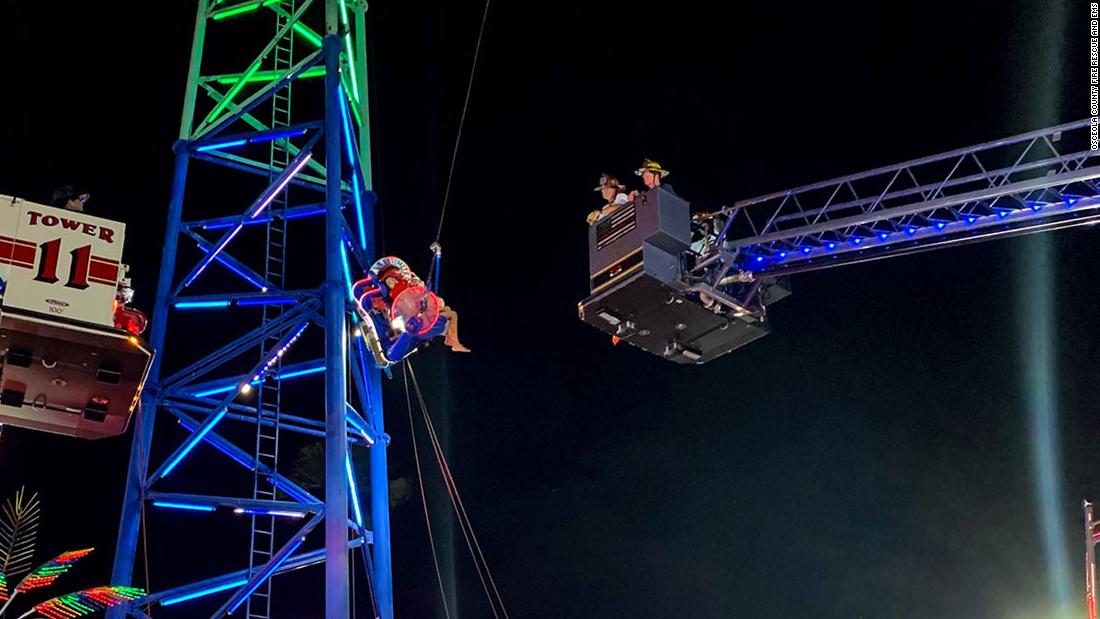 Two teens were suspended for hours on a broken amusement park ride in Florida