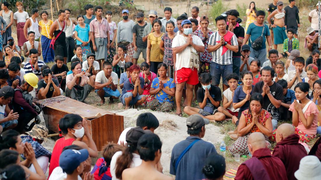 Mourners attend the funeral of Tin Hla, a 43-year-old who was reportedly shot dead by security forces during a protest.